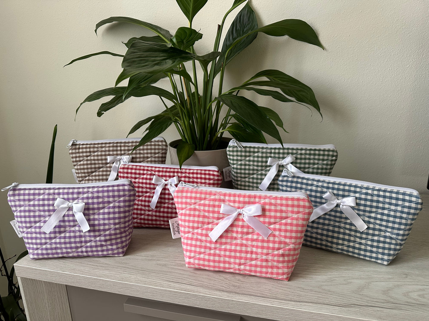Pochette a quadretti con fiocco