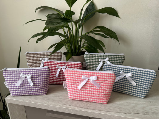 Pochette a quadretti con fiocco