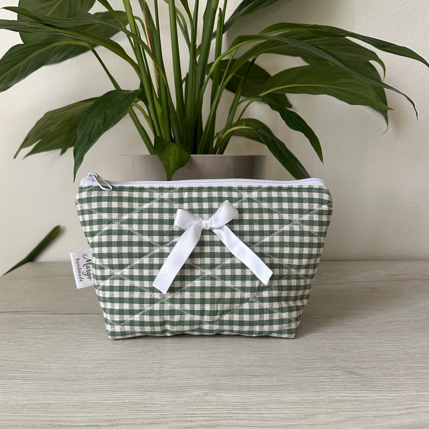 Pochette a quadretti con fiocco